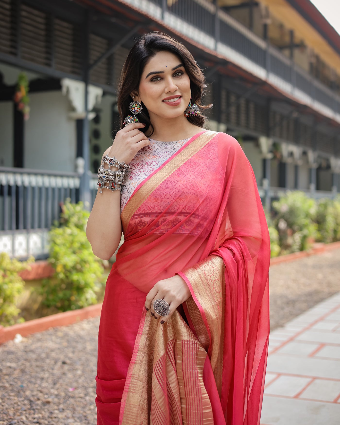 Radiant Rose Red Plain Chiffon Saree with Gold Zari Border, Intricate Printed Blouse & Tassel Accents