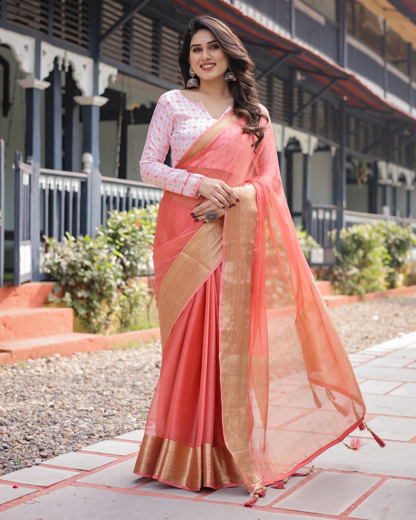 Peach Pink Plain Chiffon Saree with Gold Zari Border, Geometric Printed Blouse & Tassel Detailing