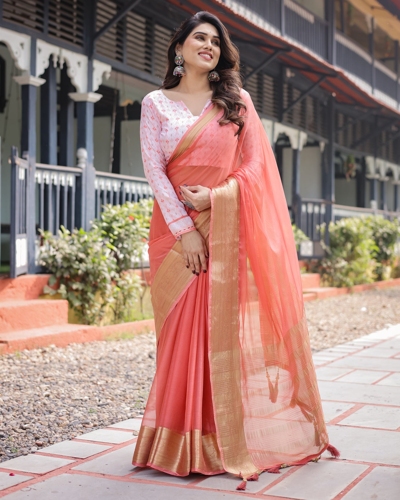 Peach Pink Plain Chiffon Saree with Gold Zari Border, Geometric Printed Blouse & Tassel Detailing