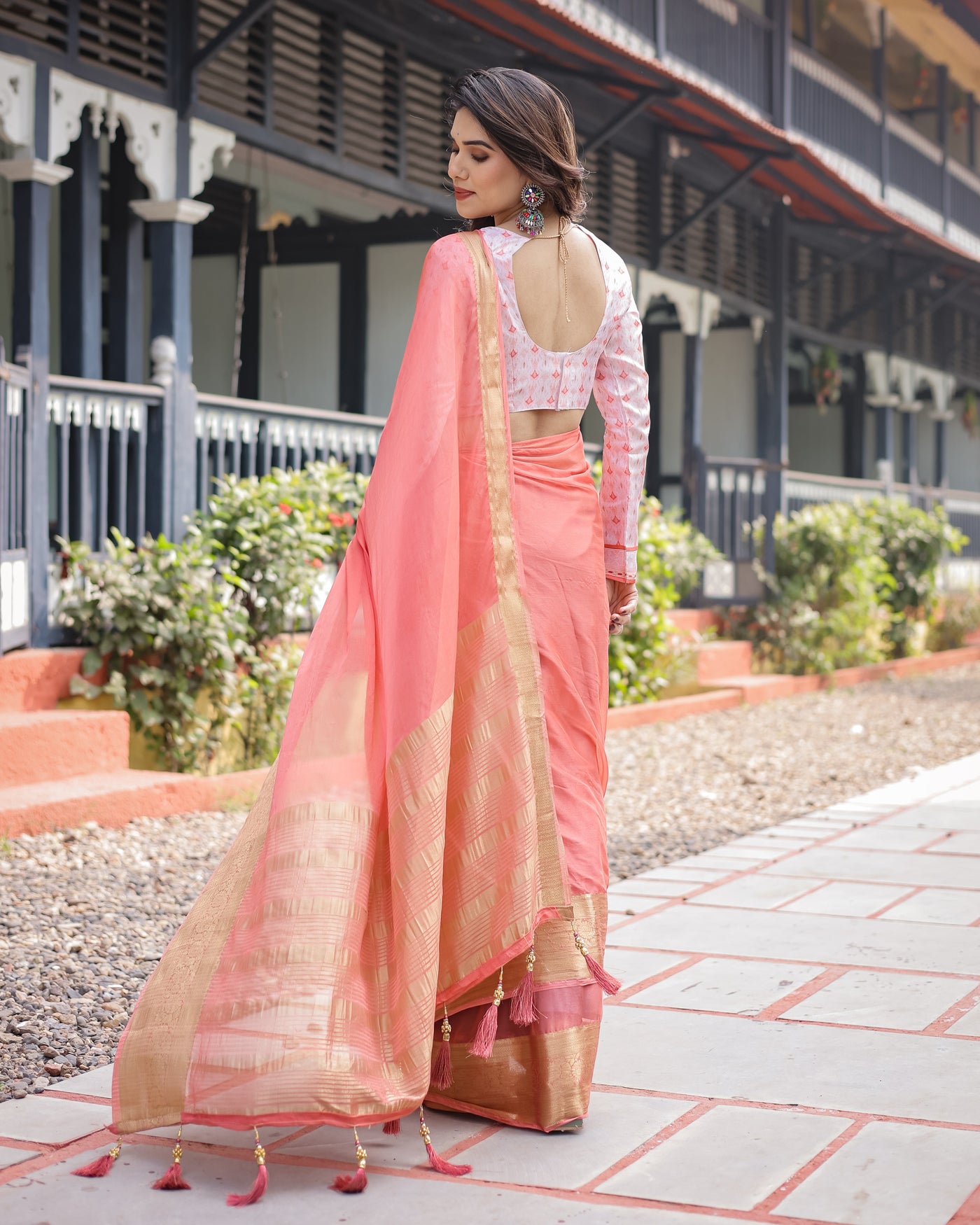 Peach Pink Plain Chiffon Saree with Gold Zari Border, Geometric Printed Blouse & Tassel Detailing