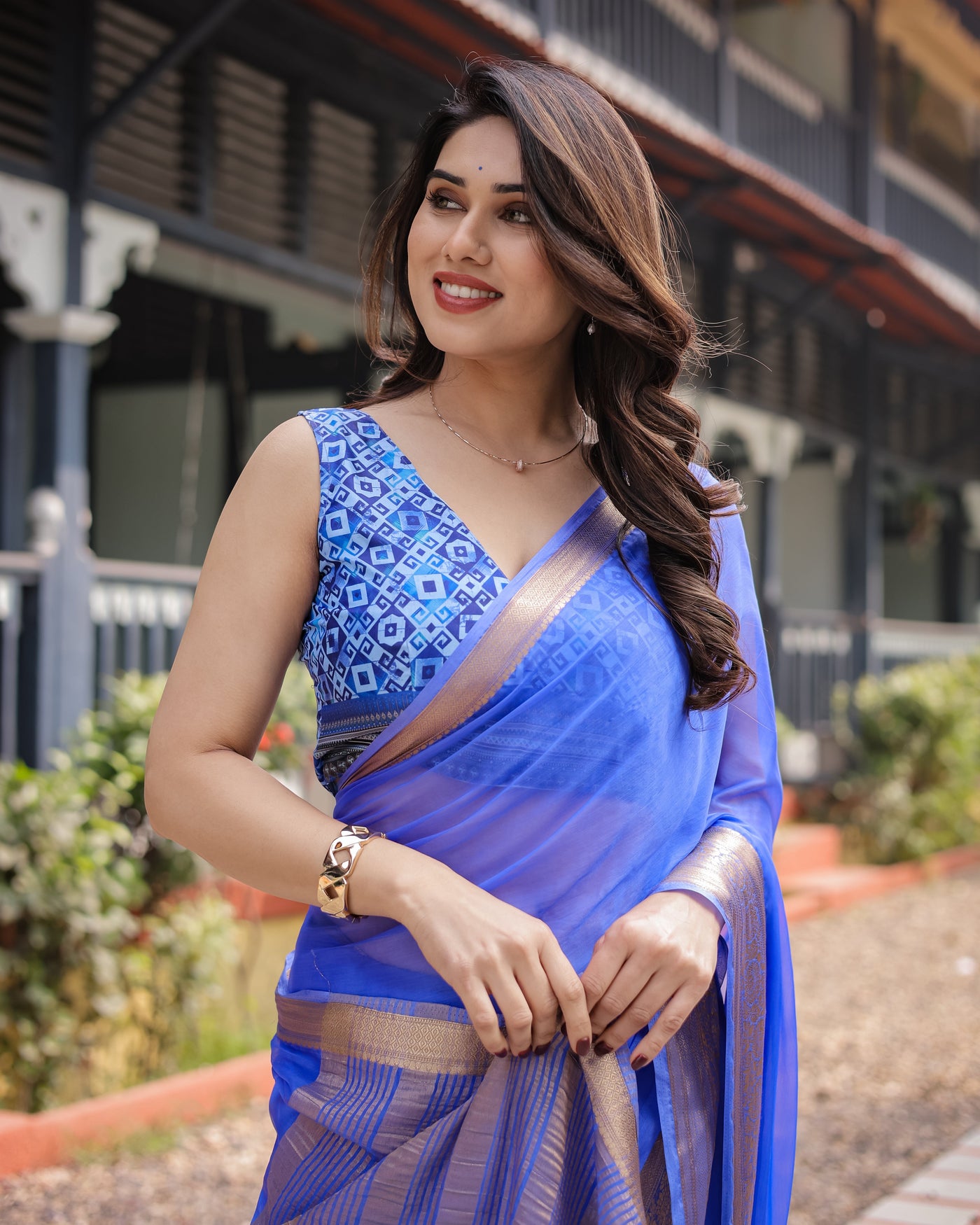 Royal Blue Plain Chiffon Saree with Gold Zari Border, Geometric Printed Blouse & Tassel Detailing