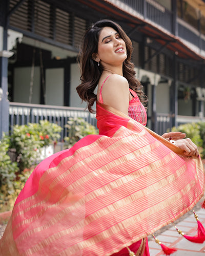 Flamingo Pink Plain Chiffon Saree with Gold Zari Border, Patterned Blouse & Tassel Detailing