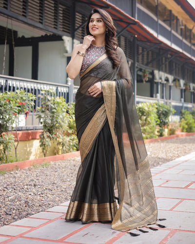 Ethereal Black Plain Chiffon Saree with Gold Zari Border, Floral Printed Blouse & Tassel Detailing