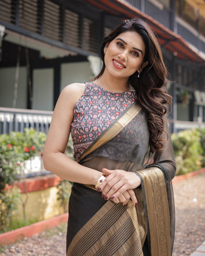 Ethereal Black Plain Chiffon Saree with Gold Zari Border, Floral Printed Blouse & Tassel Detailing