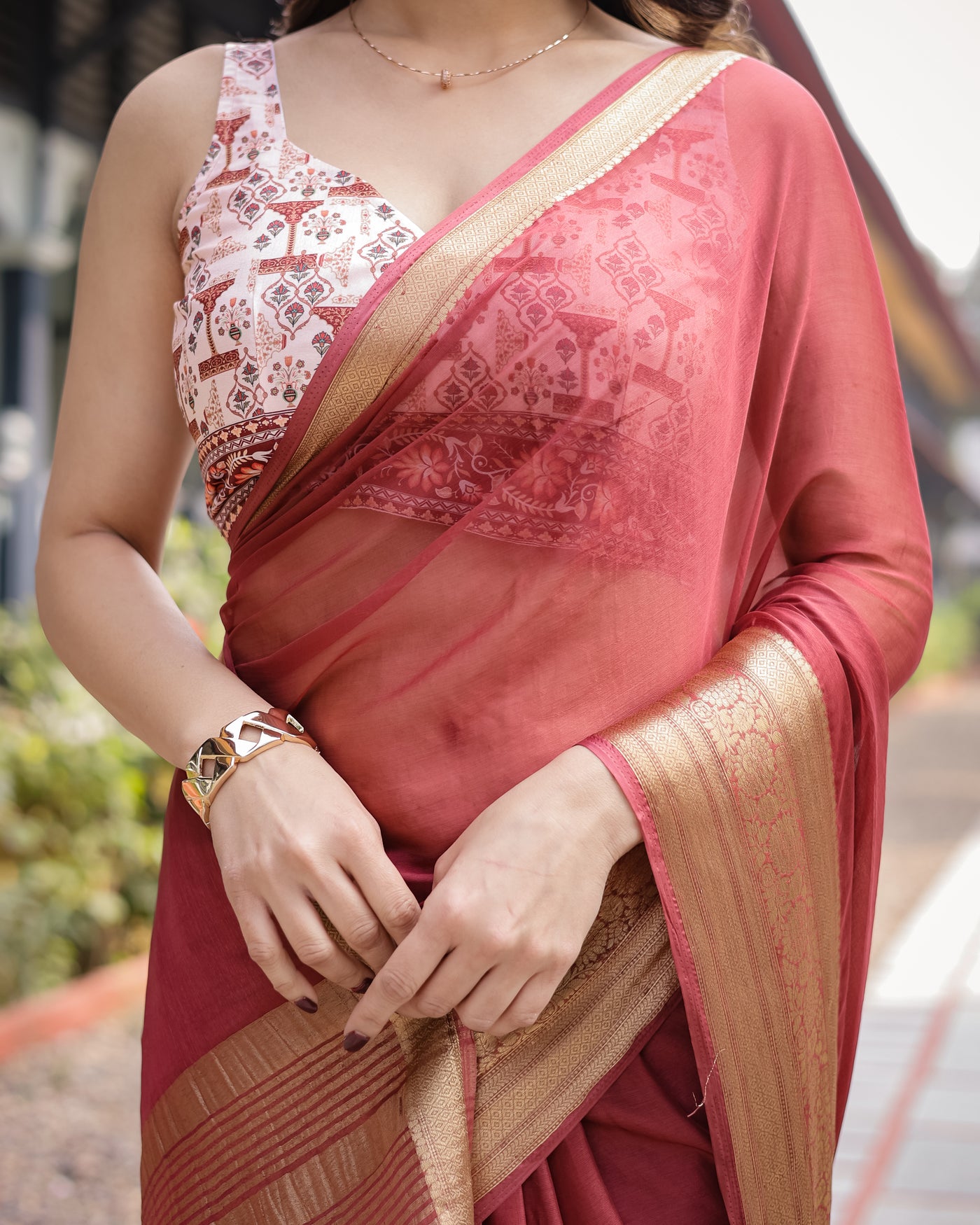 Elegant Maroon Plain Chiffon Saree with Gold Zari Border, Designer Printed Blouse & Tassel Detailing