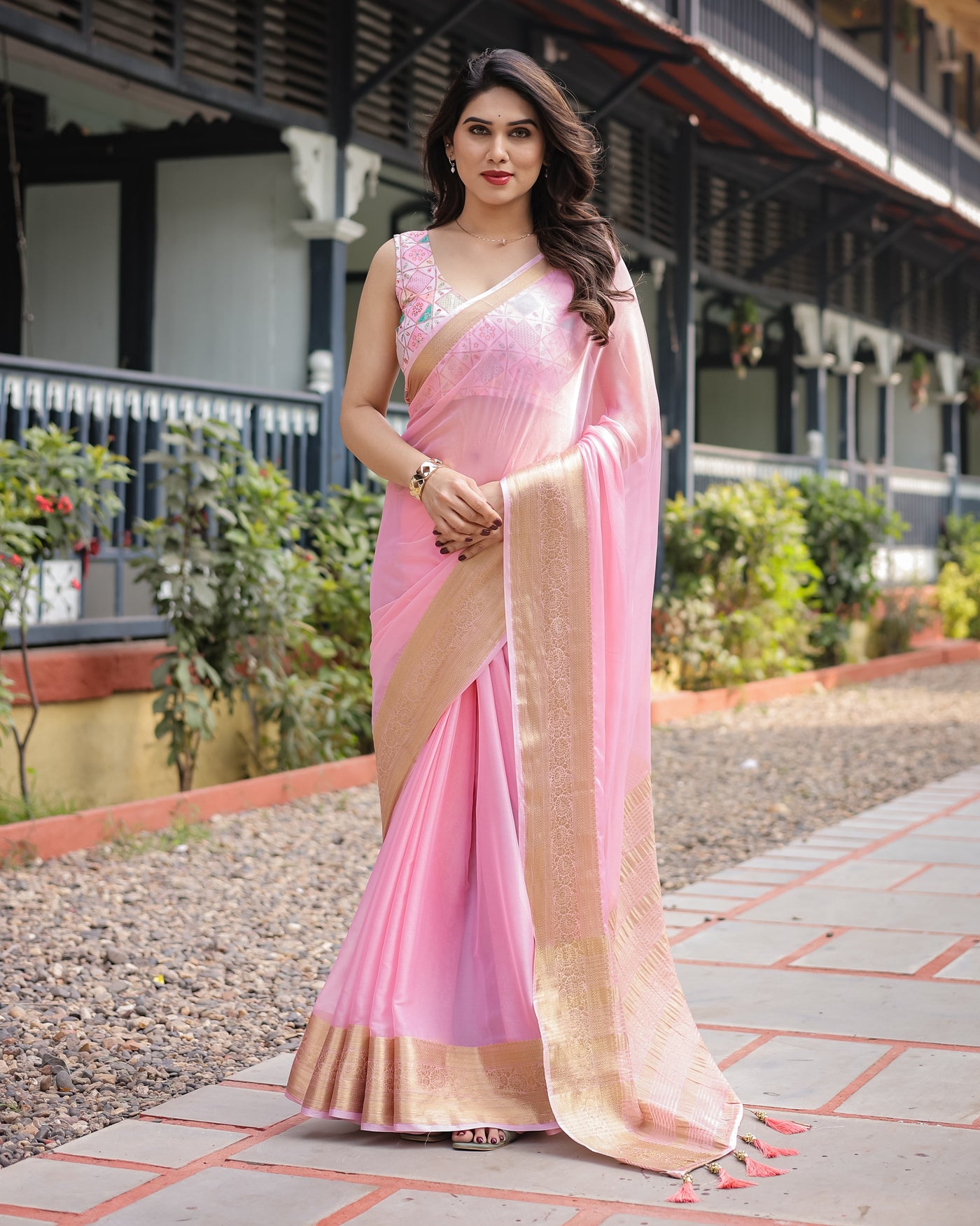 Soft Baby Pink Plain Chiffon Saree with Gold Zari Border, Geometric Embroidered Blouse & Tassel Detailing