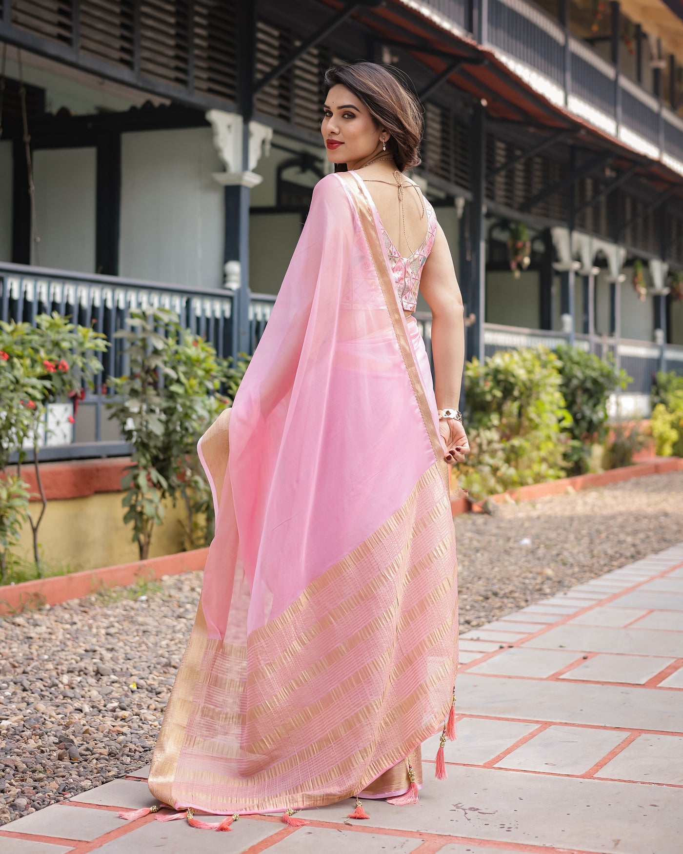 Soft Baby Pink Plain Chiffon Saree with Gold Zari Border, Geometric Embroidered Blouse & Tassel Detailing