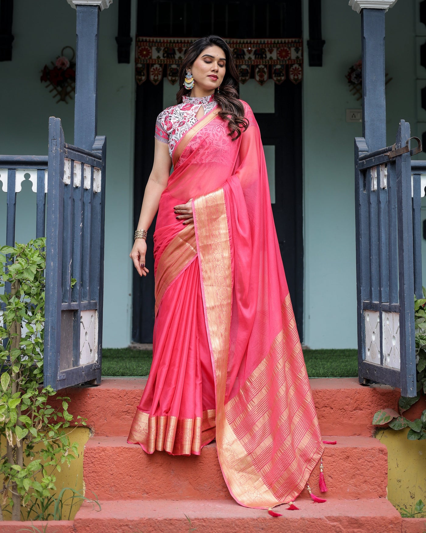 Raspberry Pink Plain Chiffon Saree with Gold Zari Border, High-Neck Floral Printed Blouse & Tassel Detailing