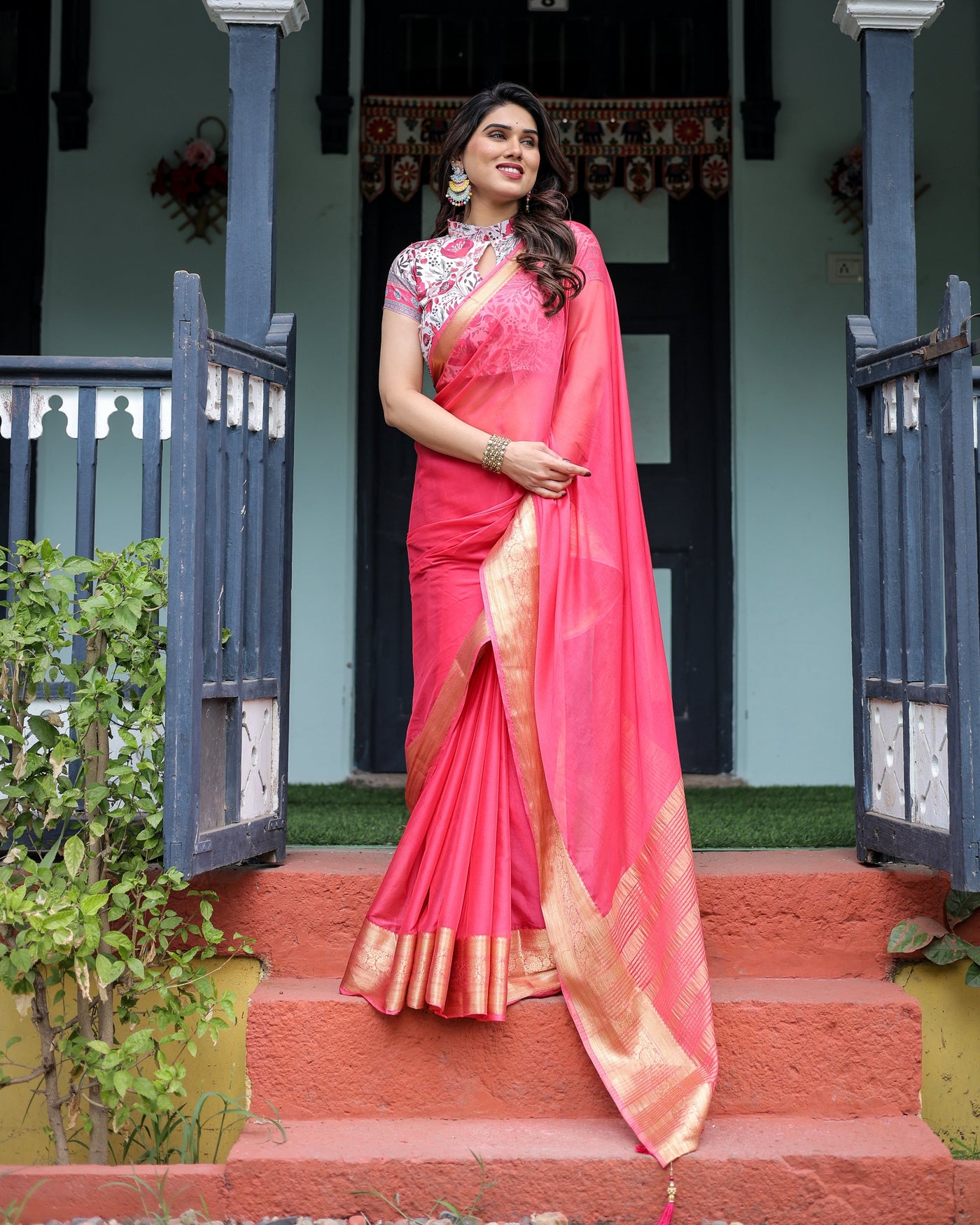 Raspberry Pink Plain Chiffon Saree with Gold Zari Border, High-Neck Floral Printed Blouse & Tassel Detailing