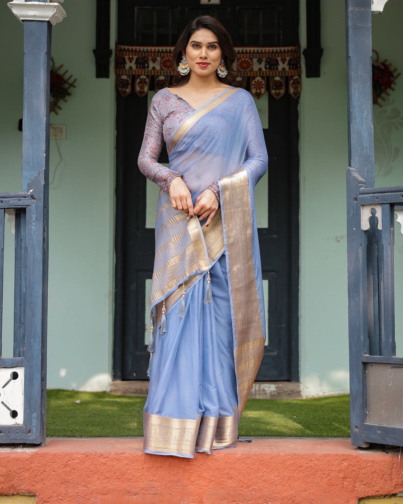 Sky Blue Plain Chiffon Saree with Gold Zari Border, Geometric Printed Blouse & Tassel Detailing