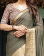 Elegant Olive Green Plain Chiffon Saree with Gold Zari Border, Floral Printed Blouse & Tassel Detailing