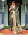 Elegant Olive Green Plain Chiffon Saree with Gold Zari Border, Floral Printed Blouse & Tassel Detailing