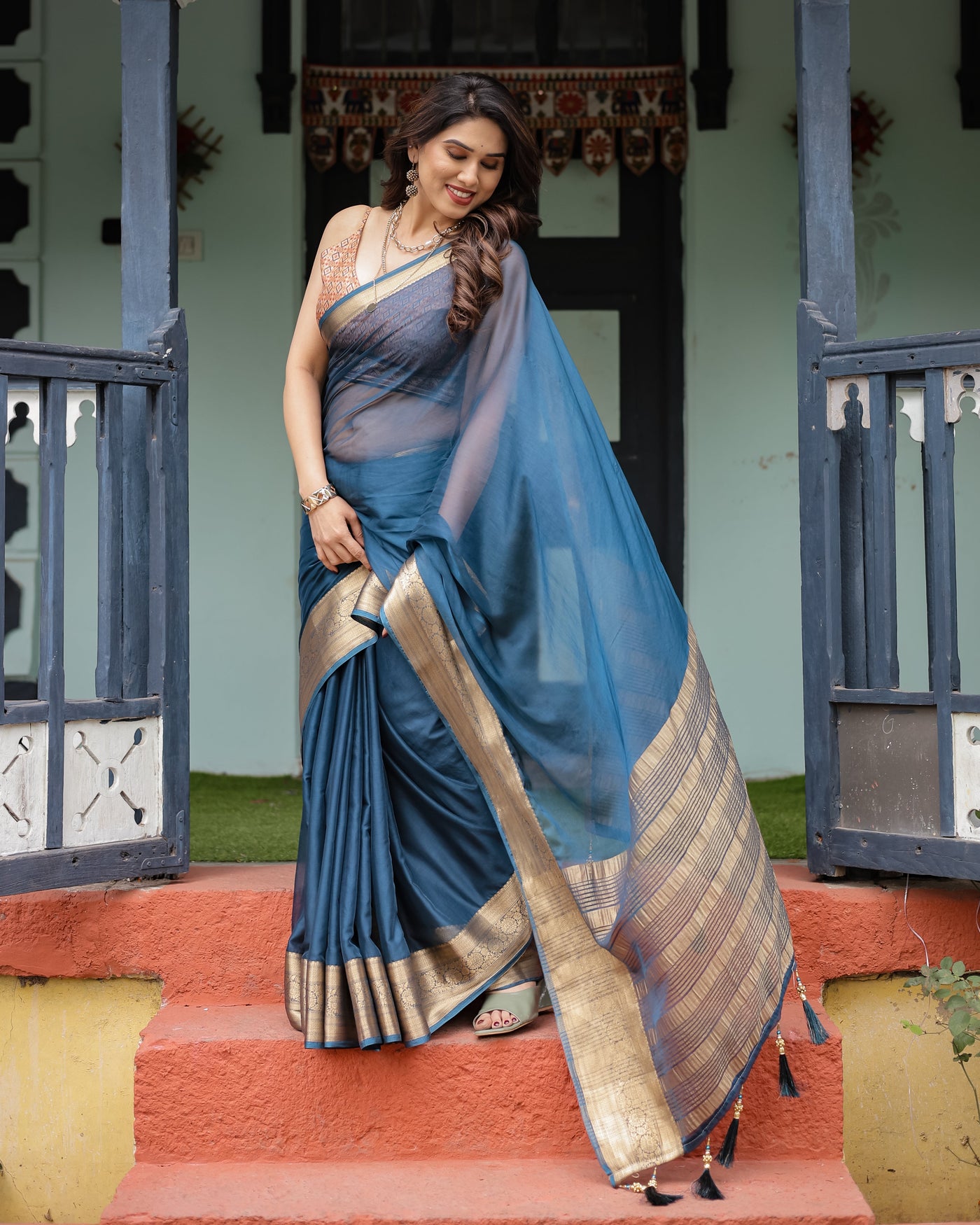 Teal Blue Plain Chiffon Saree with Gold Zari Border, Geometric Printed Blouse & Tassel Detailing