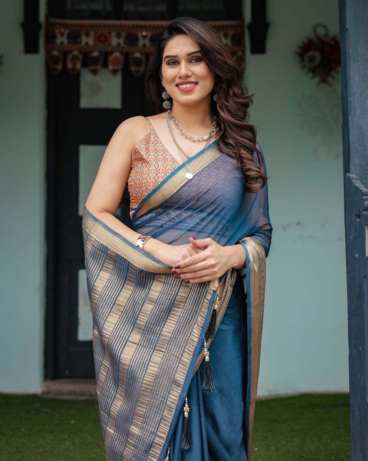 Teal Blue Plain Chiffon Saree with Gold Zari Border, Geometric Printed Blouse & Tassel Detailing