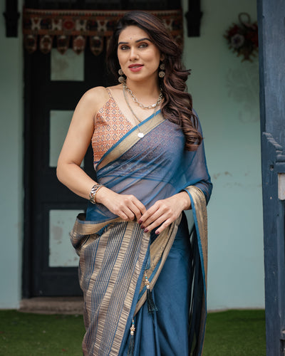 Teal Blue Plain Chiffon Saree with Gold Zari Border, Geometric Printed Blouse & Tassel Detailing