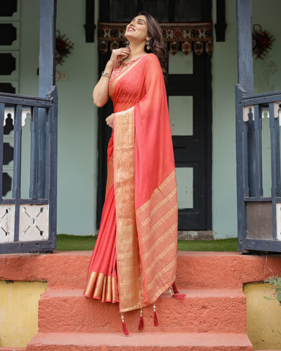 Graceful Coral Pink Plain Chiffon Saree with Gold Zari Border, Floral Embroidered Blouse & Tassel Detailing