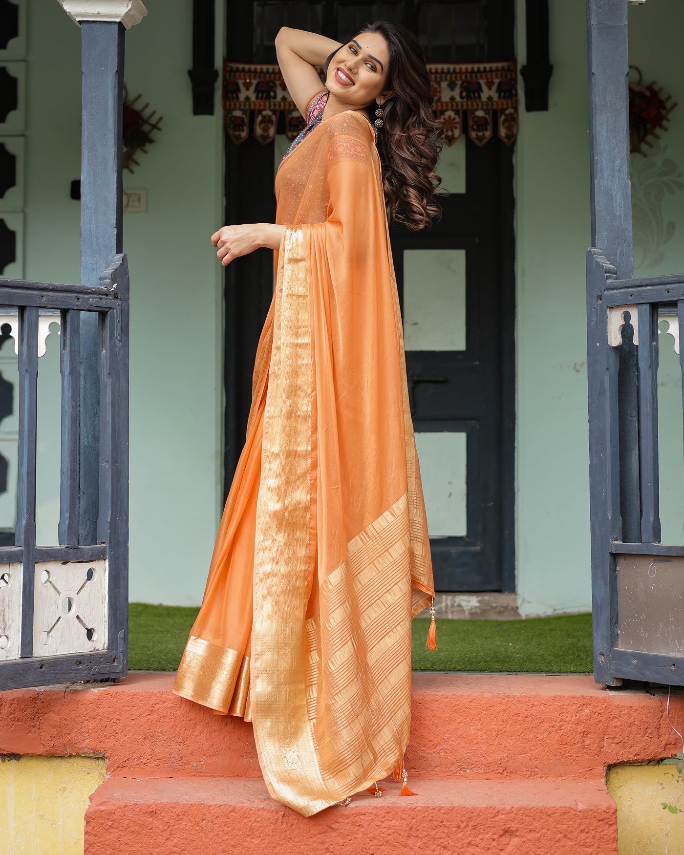 Elegant Tangerine Orange Plain Chiffon Saree with Gold Zari Border, Geometric Printed Blouse & Tassel Detailing