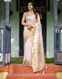 Ethereal Off-White Plain Chiffon Saree with Gold Zari Border, Intricate Floral Printed Blouse & Tassel Detailing