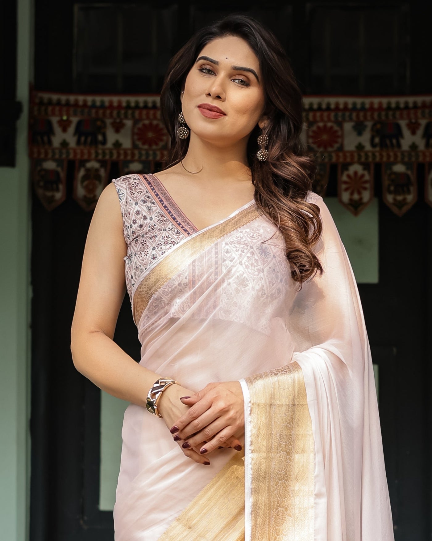 Ethereal Off-White Plain Chiffon Saree with Gold Zari Border, Intricate Floral Printed Blouse & Tassel Detailing