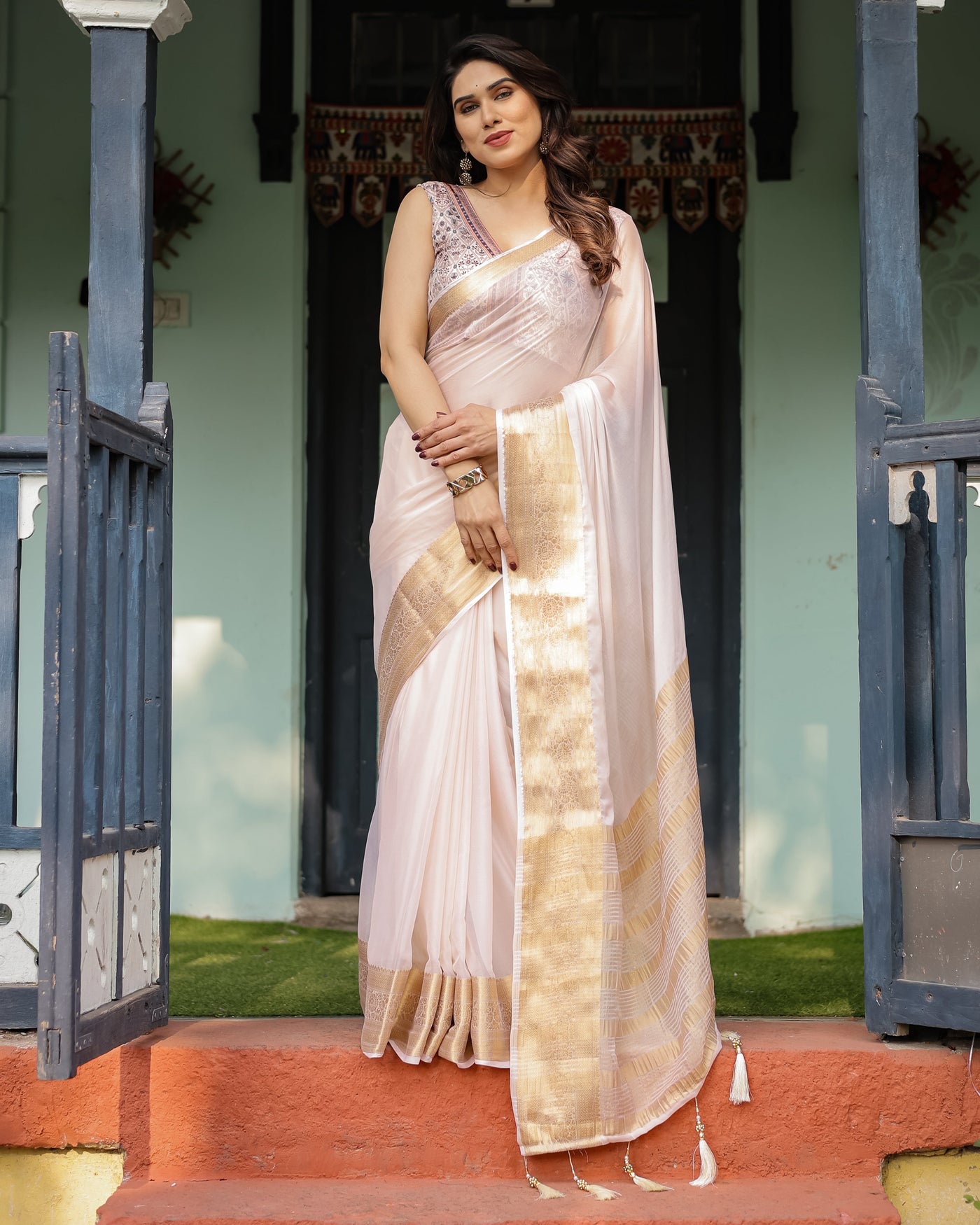 Ethereal Off-White Plain Chiffon Saree with Gold Zari Border, Intricate Floral Printed Blouse & Tassel Detailing