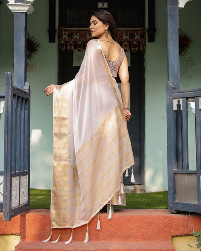 Ethereal Off-White Plain Chiffon Saree with Gold Zari Border, Intricate Floral Printed Blouse & Tassel Detailing