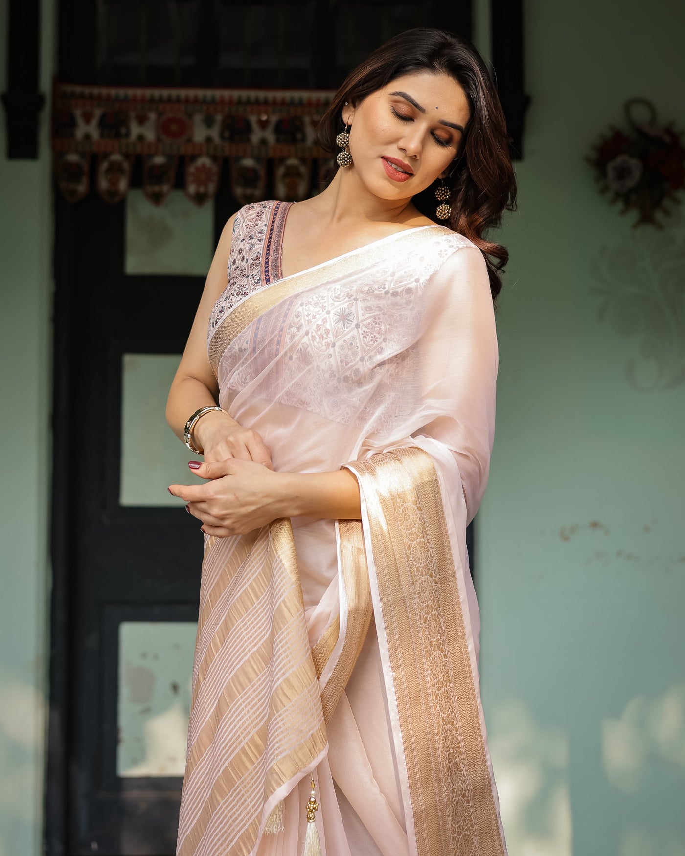 Ethereal Off-White Plain Chiffon Saree with Gold Zari Border, Intricate Floral Printed Blouse & Tassel Detailing