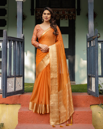 Sunset Orange Plain Chiffon Saree with Gold Zari Border, Floral Embroidered Blouse & Tassel Detailing