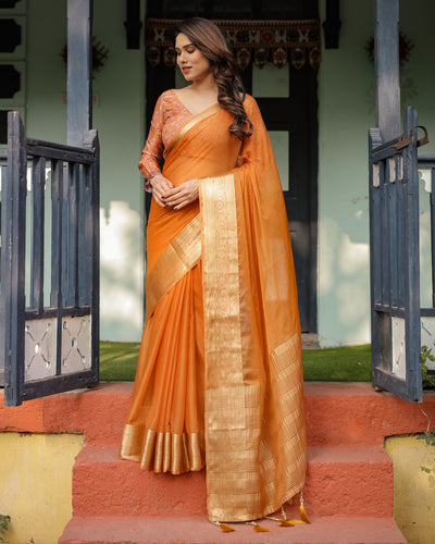 Sunset Orange Plain Chiffon Saree with Gold Zari Border, Floral Embroidered Blouse & Tassel Detailing