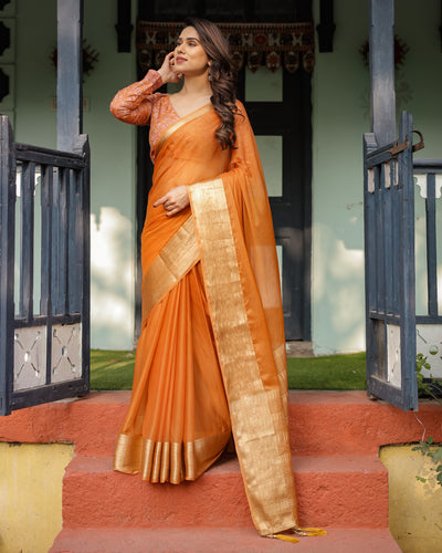 Sunset Orange Plain Chiffon Saree with Gold Zari Border, Floral Embroidered Blouse & Tassel Detailing