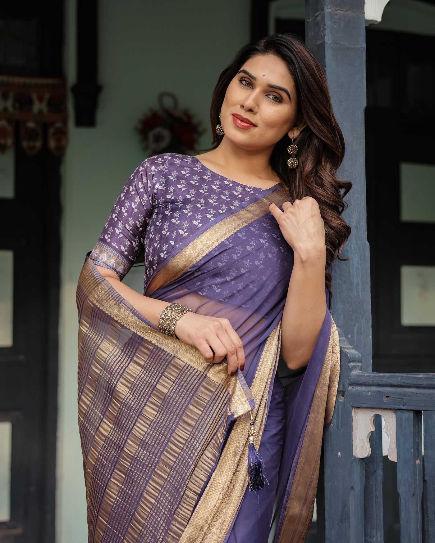 Deep Violet Plain Chiffon Saree with Gold Zari Border, Floral Printed Blouse & Tassel Detailing