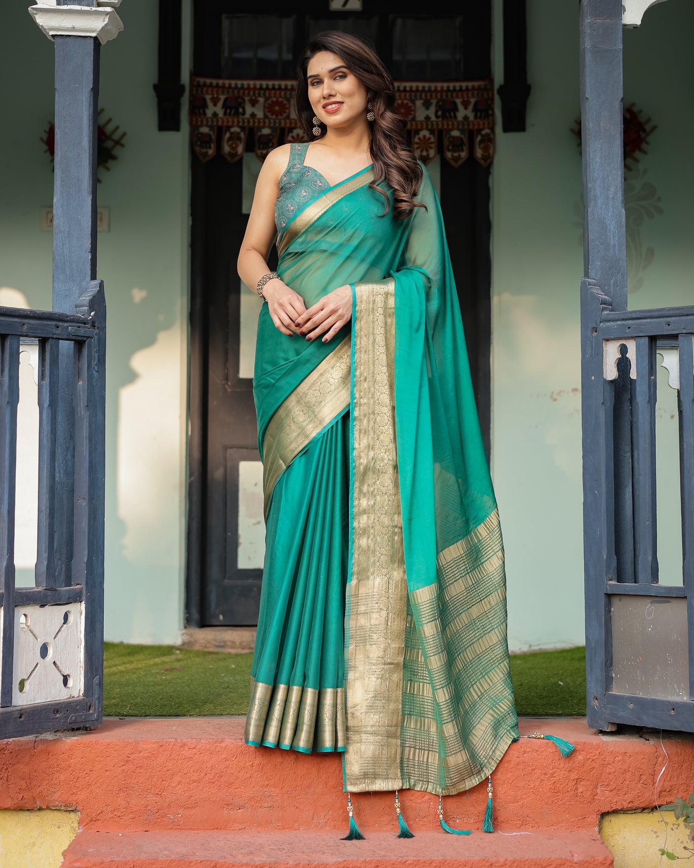 Elegant Sea Green Plain Chiffon Saree with Gold Zari Border, Paisley Printed Blouse & Tassel Detailing