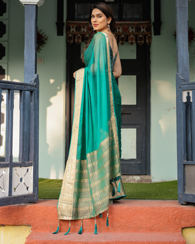 Elegant Sea Green Plain Chiffon Saree with Gold Zari Border, Paisley Printed Blouse & Tassel Detailing