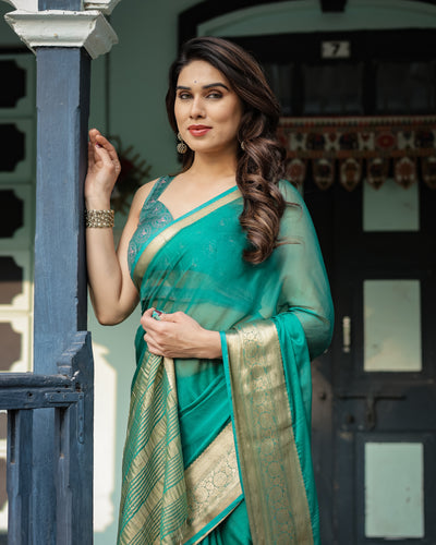 Elegant Sea Green Plain Chiffon Saree with Gold Zari Border, Paisley Printed Blouse & Tassel Detailing