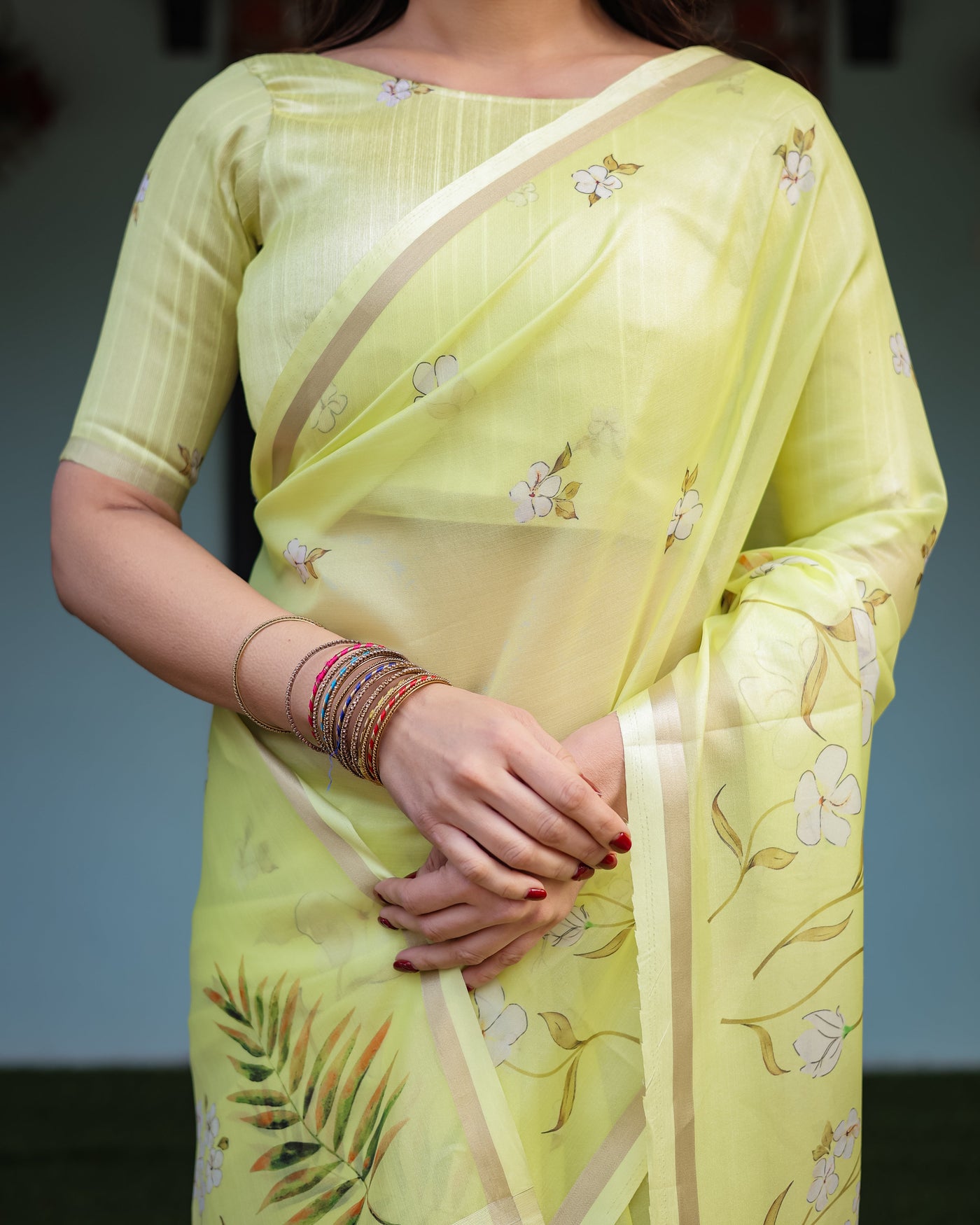 Lime Yellow Pastel Floral Print Premium Organza Saree with Zari Weave, and Tassel Details