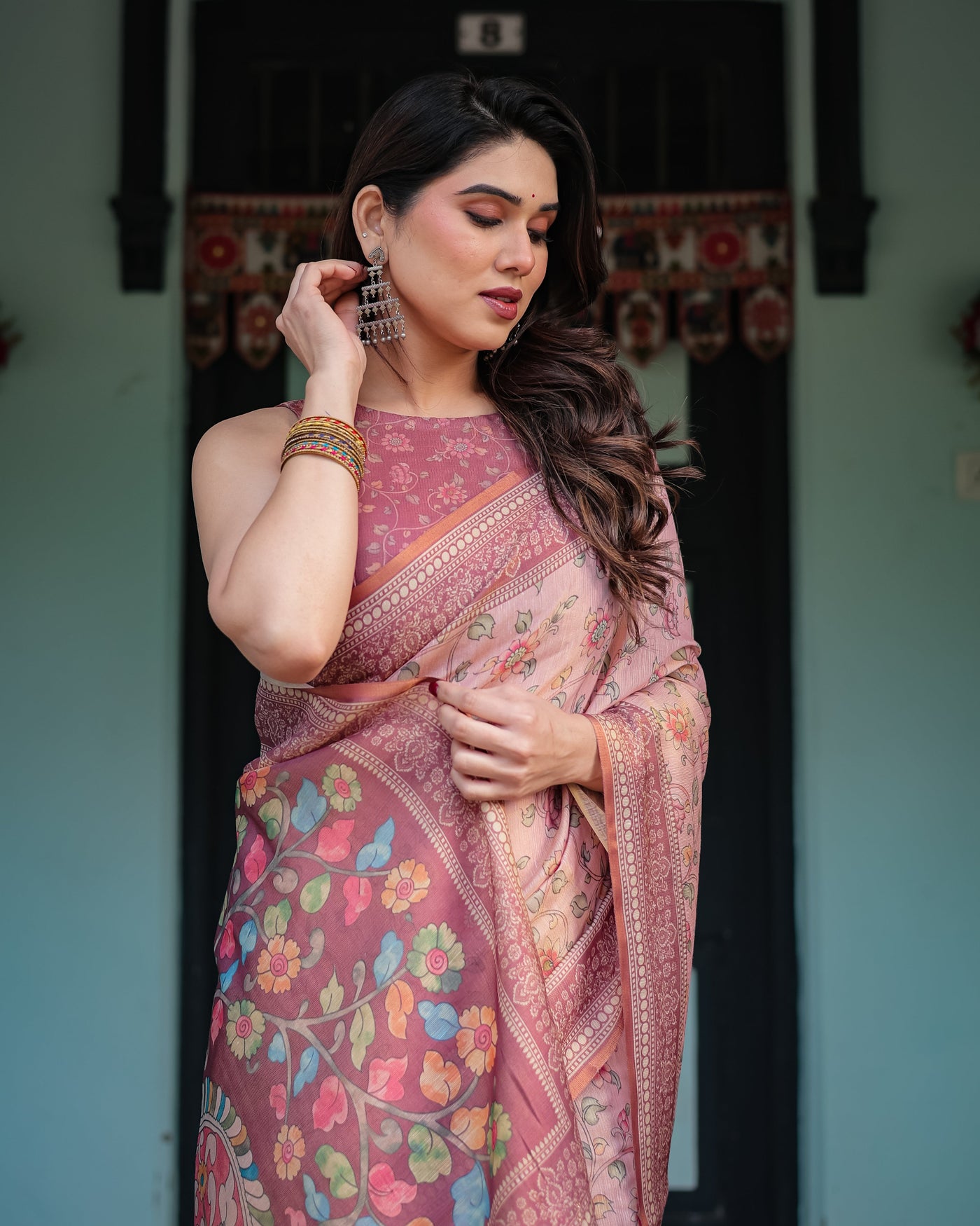 Blush Pink Handloom Cotton-Linen Saree with Floral Motifs and Artistic Pallu