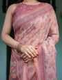 Blush Pink Handloom Cotton-Linen Saree with Floral Motifs and Artistic Pallu