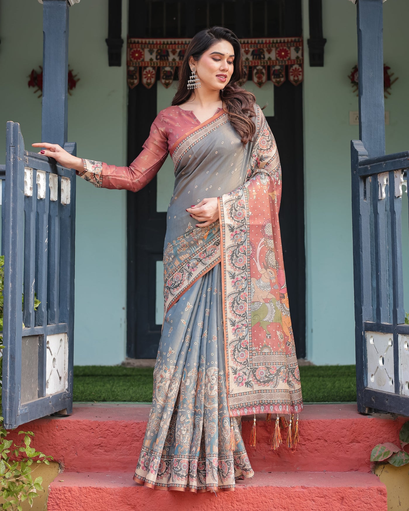 Slate Blue Handloom Cotton-Linen Saree with Vibrant Folk Motifs and Floral Pallu