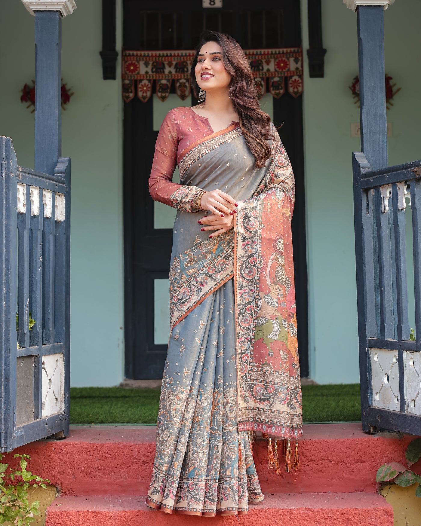 Slate Blue Handloom Cotton-Linen Saree with Vibrant Folk Motifs and Floral Pallu