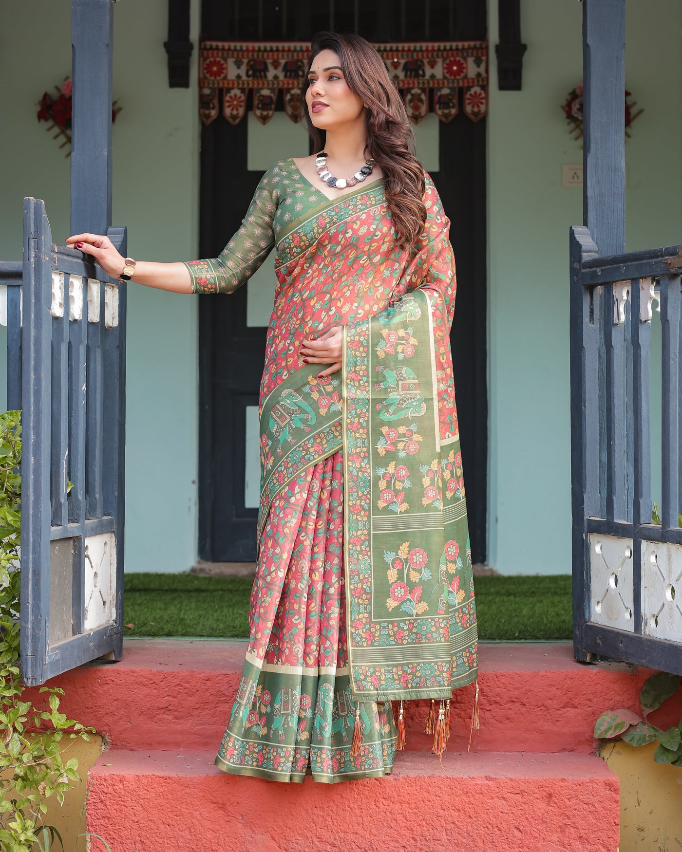 Green and Red Handloom Cotton-Linen Saree with Elephant Motifs and Floral Detailing