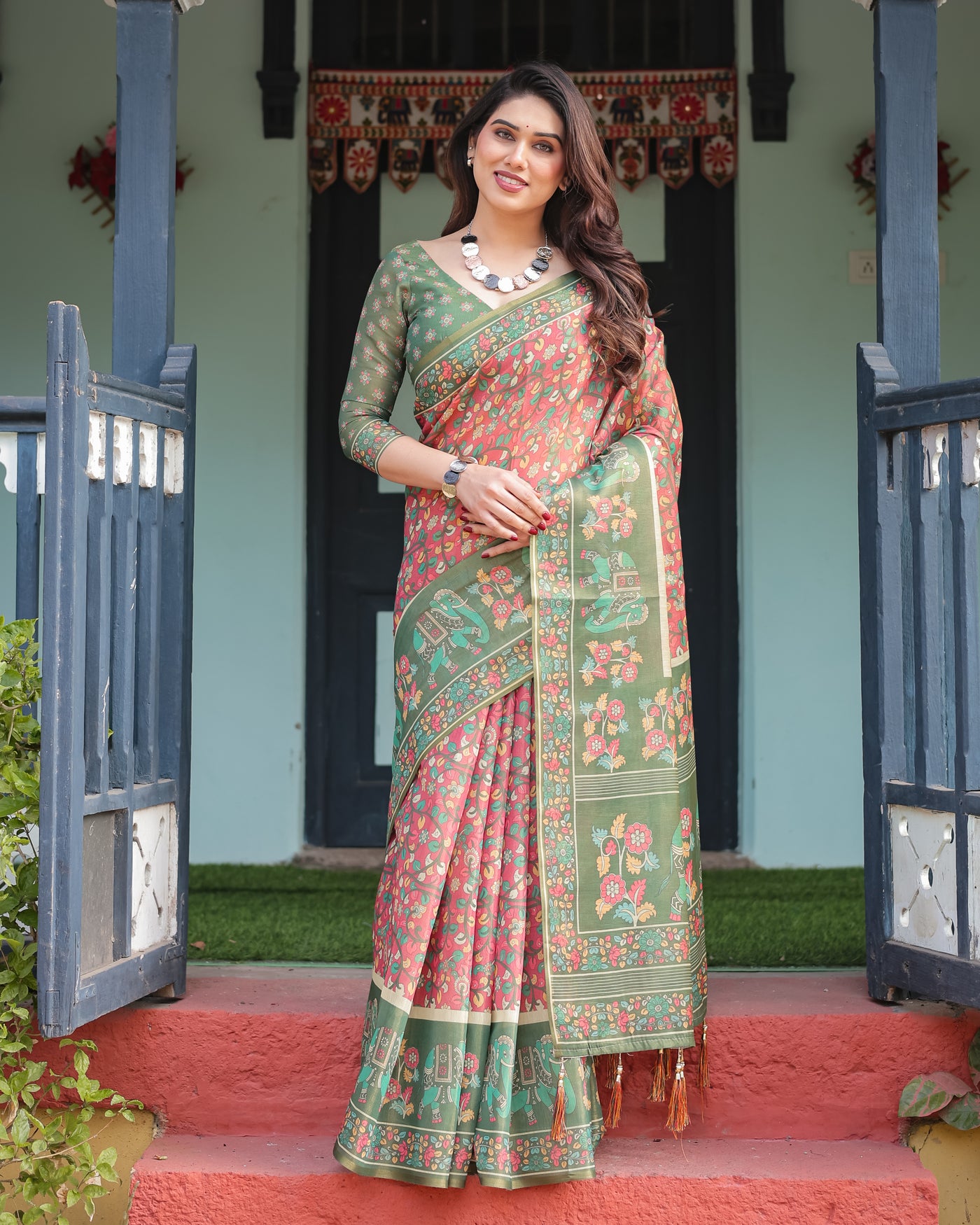 Green and Red Handloom Cotton-Linen Saree with Elephant Motifs and Floral Detailing