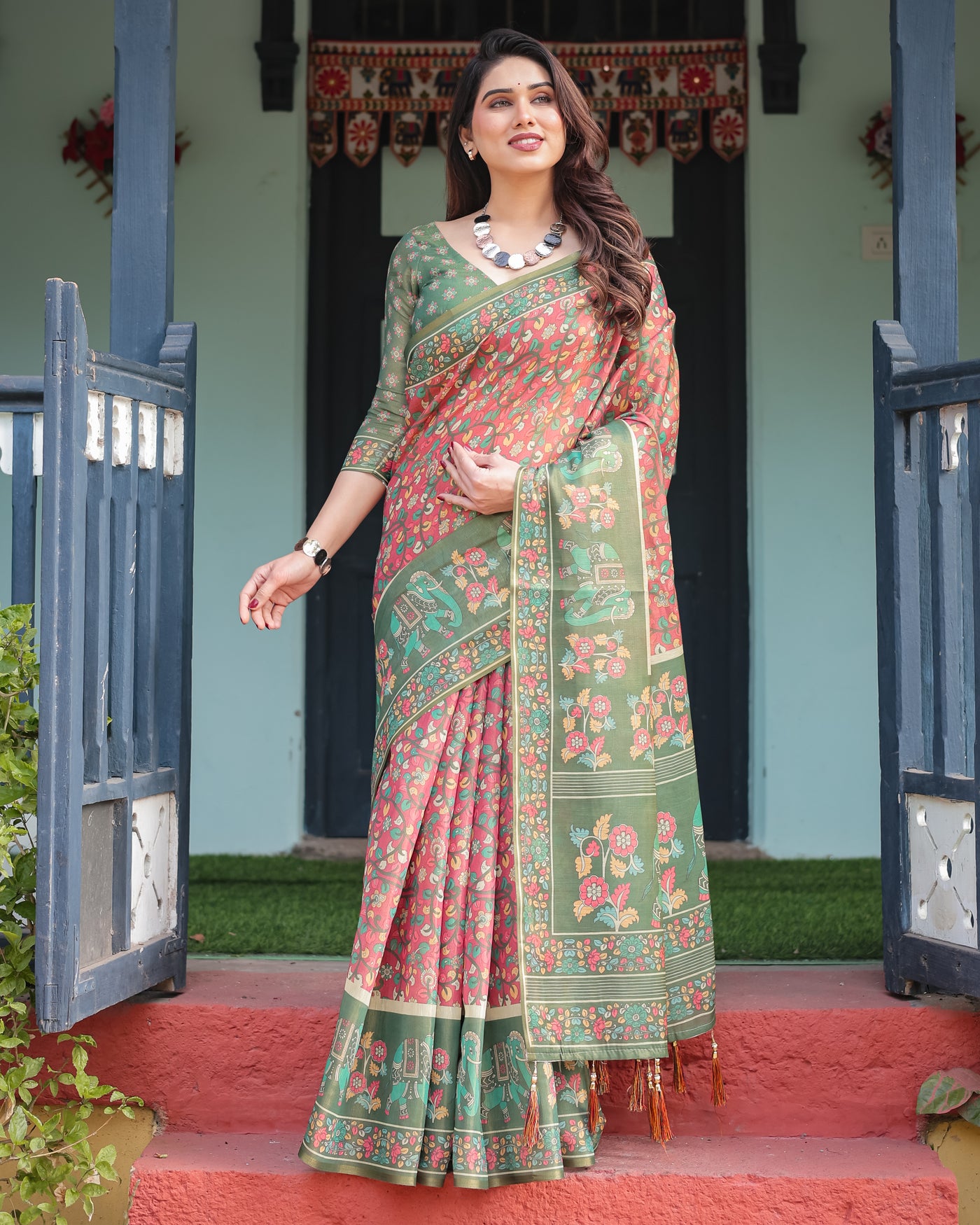 Green and Red Handloom Cotton-Linen Saree with Elephant Motifs and Floral Detailing