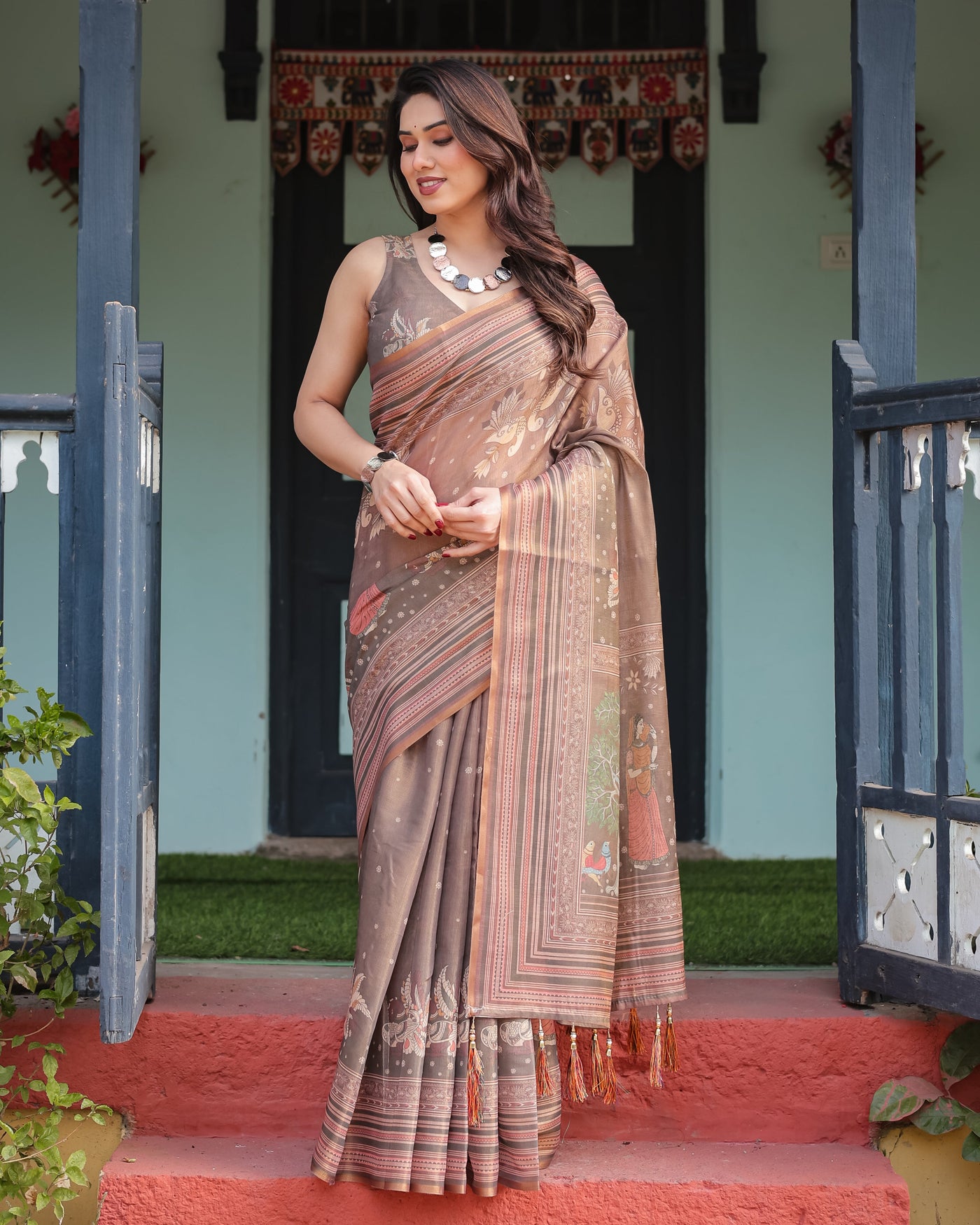 Earthy Brown Handloom Cotton-Linen Saree with Bird Motifs and Striped Detailing