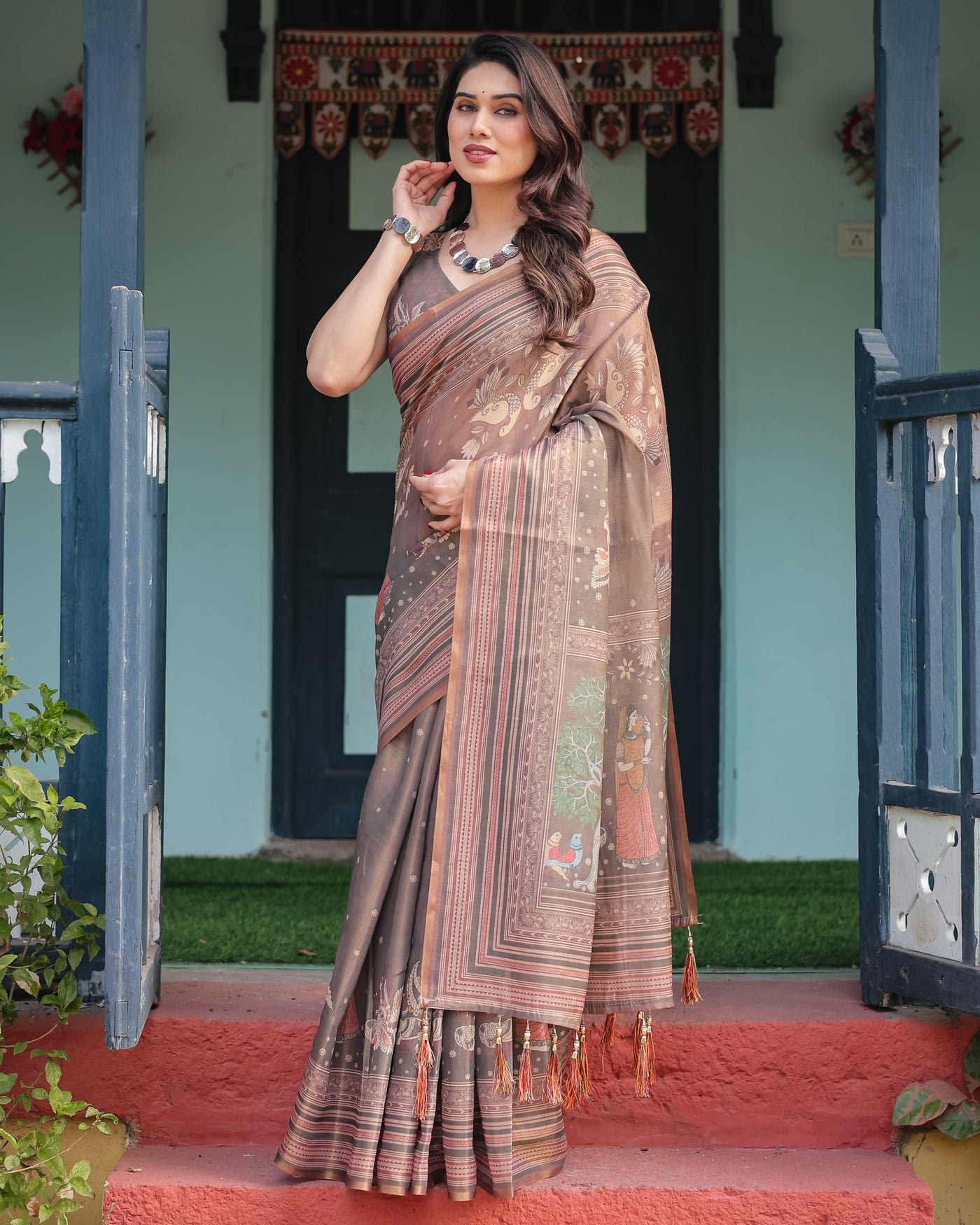 Earthy Brown Handloom Cotton-Linen Saree with Bird Motifs and Striped Detailing