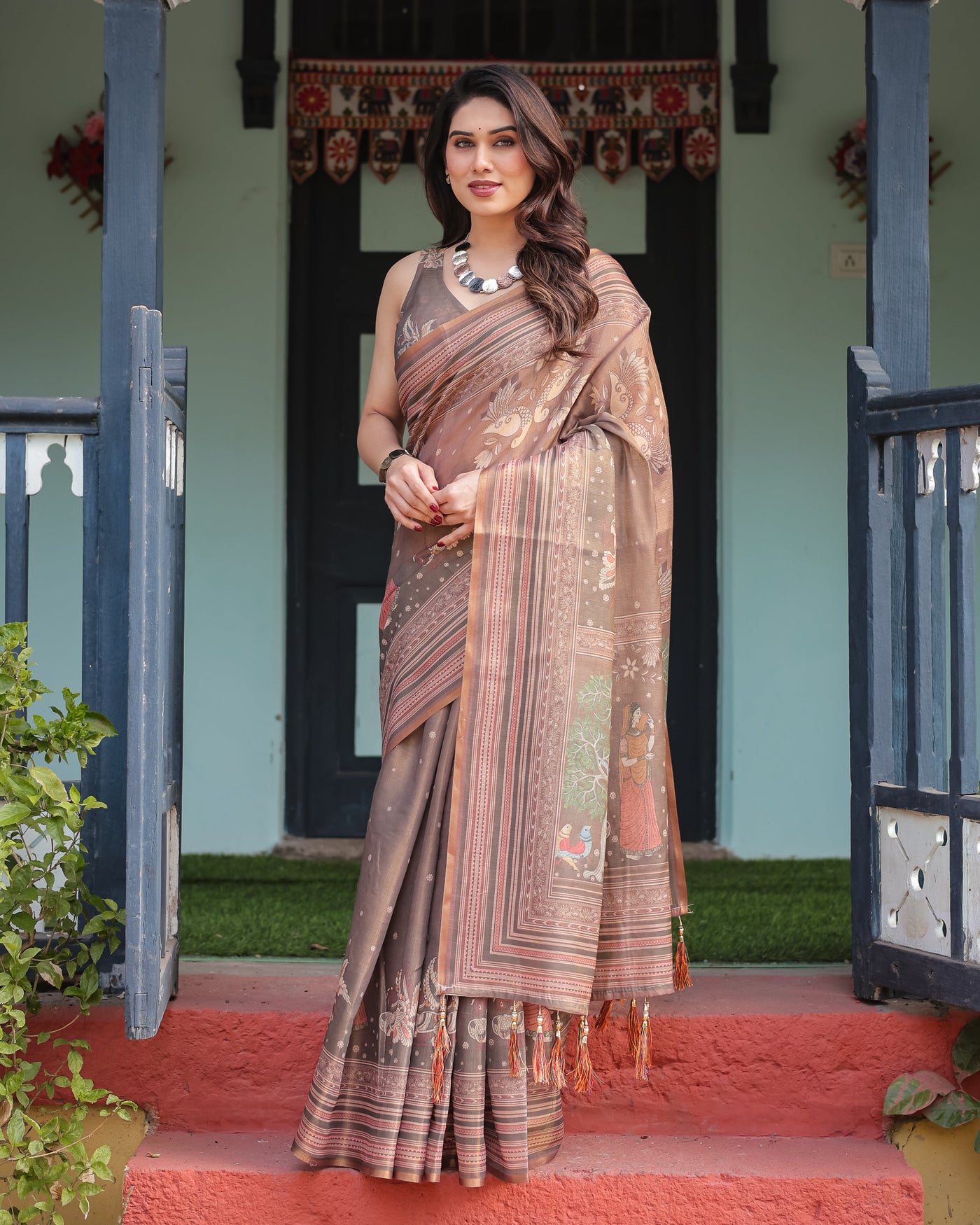 Earthy Brown Handloom Cotton-Linen Saree with Bird Motifs and Striped Detailing