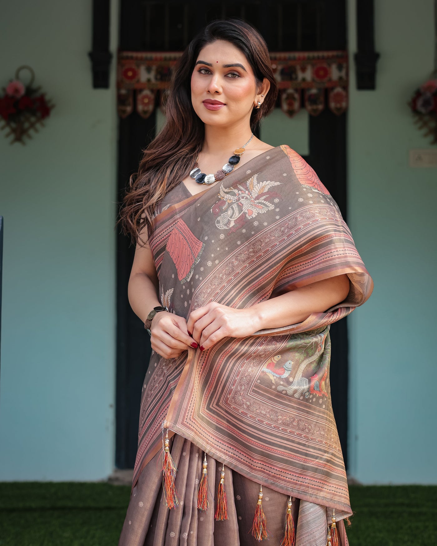 Earthy Brown Handloom Cotton-Linen Saree with Bird Motifs and Striped Detailing