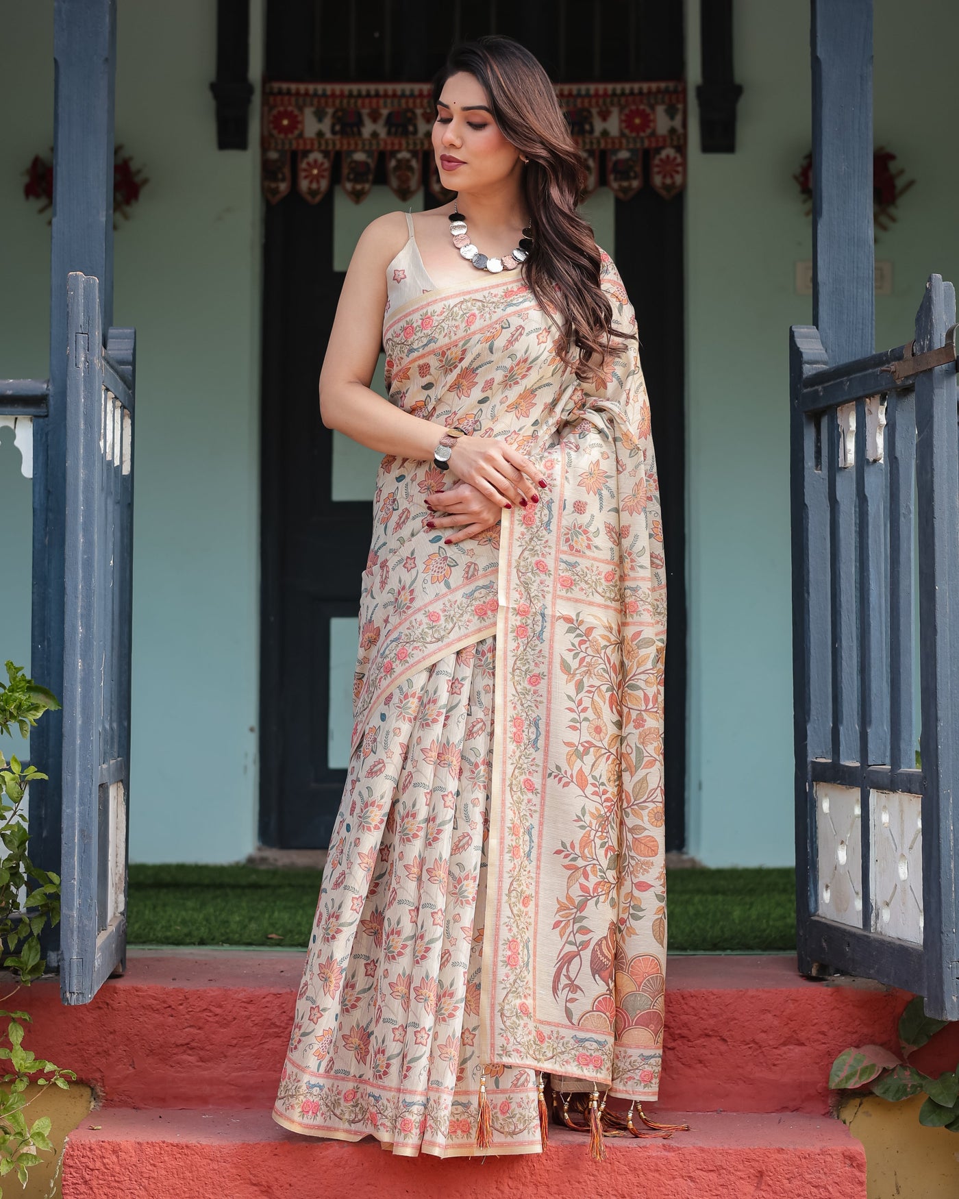 Elegant Beige Handloom Cotton-Linen Saree with Golden Zari Weave, Floral Printed Pallu & Tassel Detailing