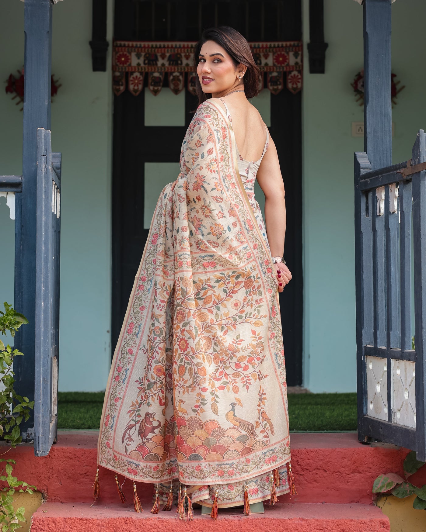 Elegant Beige Handloom Cotton-Linen Saree with Golden Zari Weave, Floral Printed Pallu & Tassel Detailing