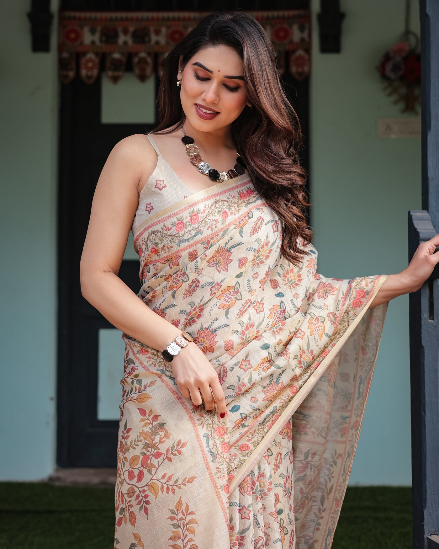 Elegant Beige Handloom Cotton-Linen Saree with Golden Zari Weave, Floral Printed Pallu & Tassel Detailing