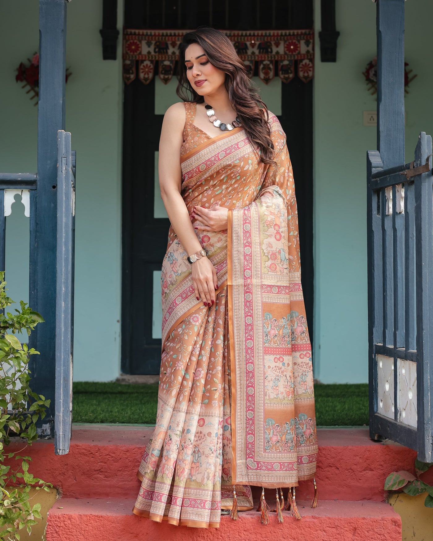 Warm Gold Pure Linen Cotton Handloom Printed Saree with Floral and Figurative Patterns, Golden Zari Weave, Tassels, and Slub Texture