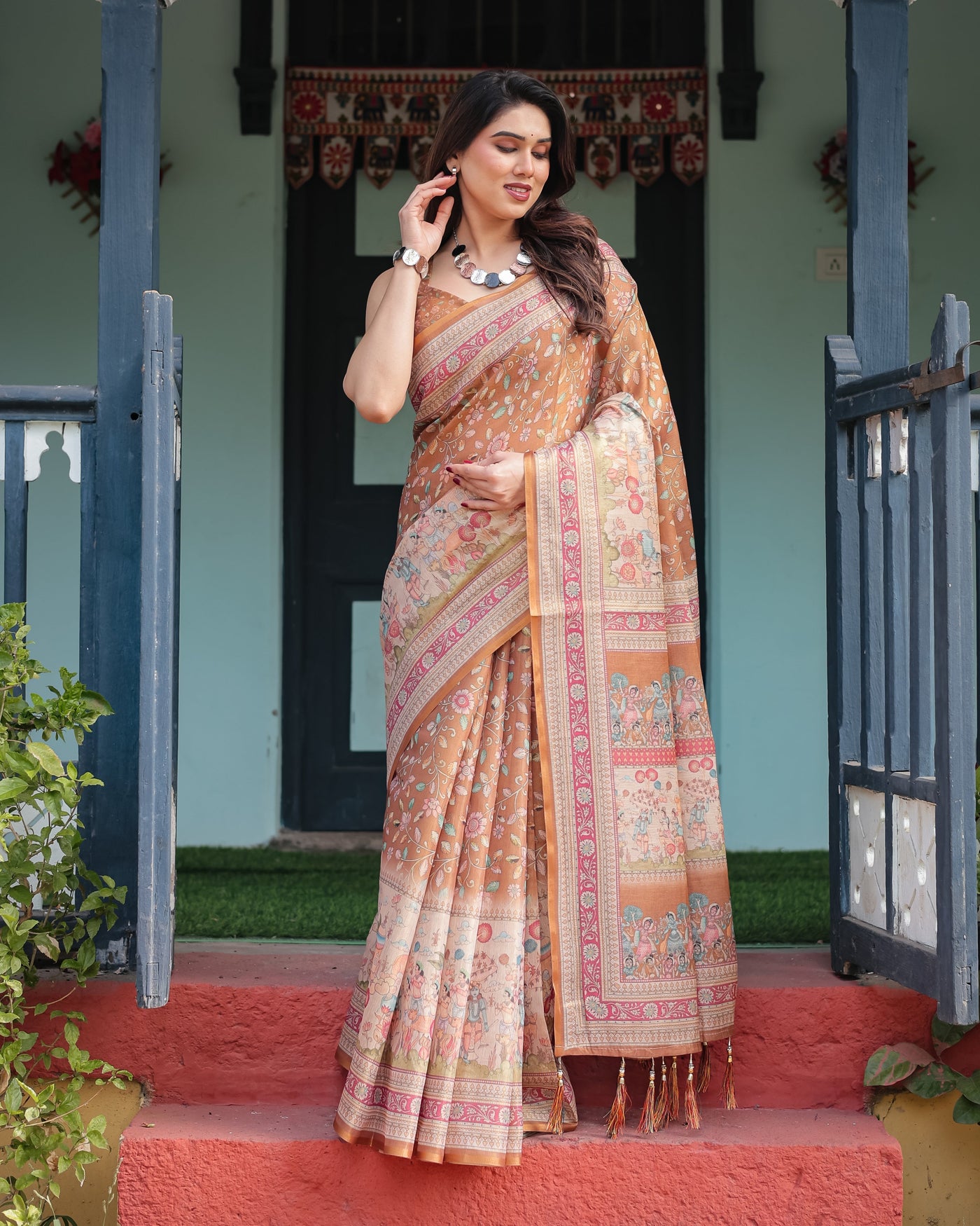 Warm Gold Pure Linen Cotton Handloom Printed Saree with Floral and Figurative Patterns, Golden Zari Weave, Tassels, and Slub Texture